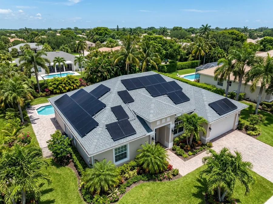 Illustrative South Florida home featuring solar panels